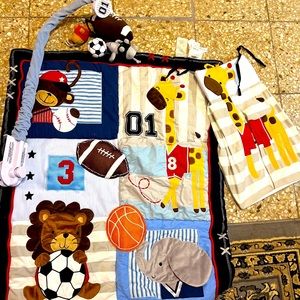 Boys crib set, all this also bed sheet and bed skirt included. Looks brand new.